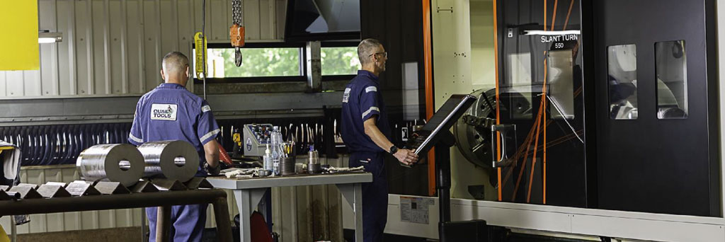 Aerial view of warehouse area filled with brown pipes